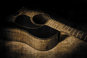 guitar in wood texture background