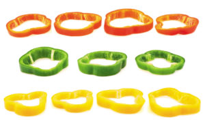 Set of sliced red, green, yellow bell pepper section pieces isolated over white background